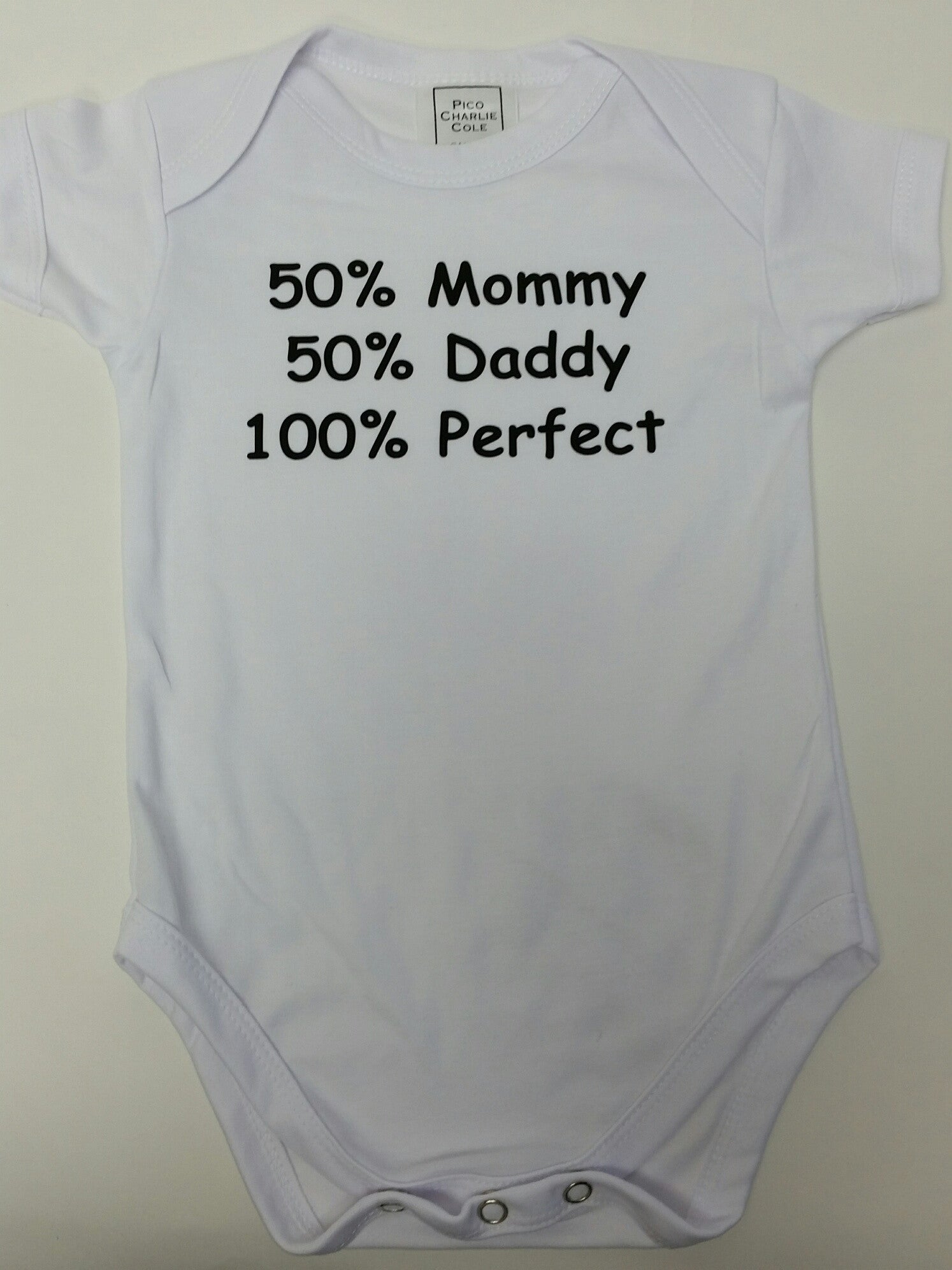 50% Mommy 50% Daddy 100% Perfect baby one piece. Made of 100% cotton. Heat pressed.